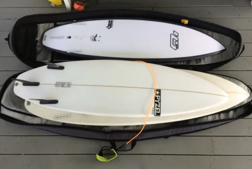 how to pack a surfboard for travel in a board bag