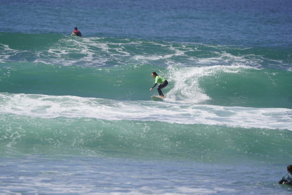 Woman surfing in Morocco